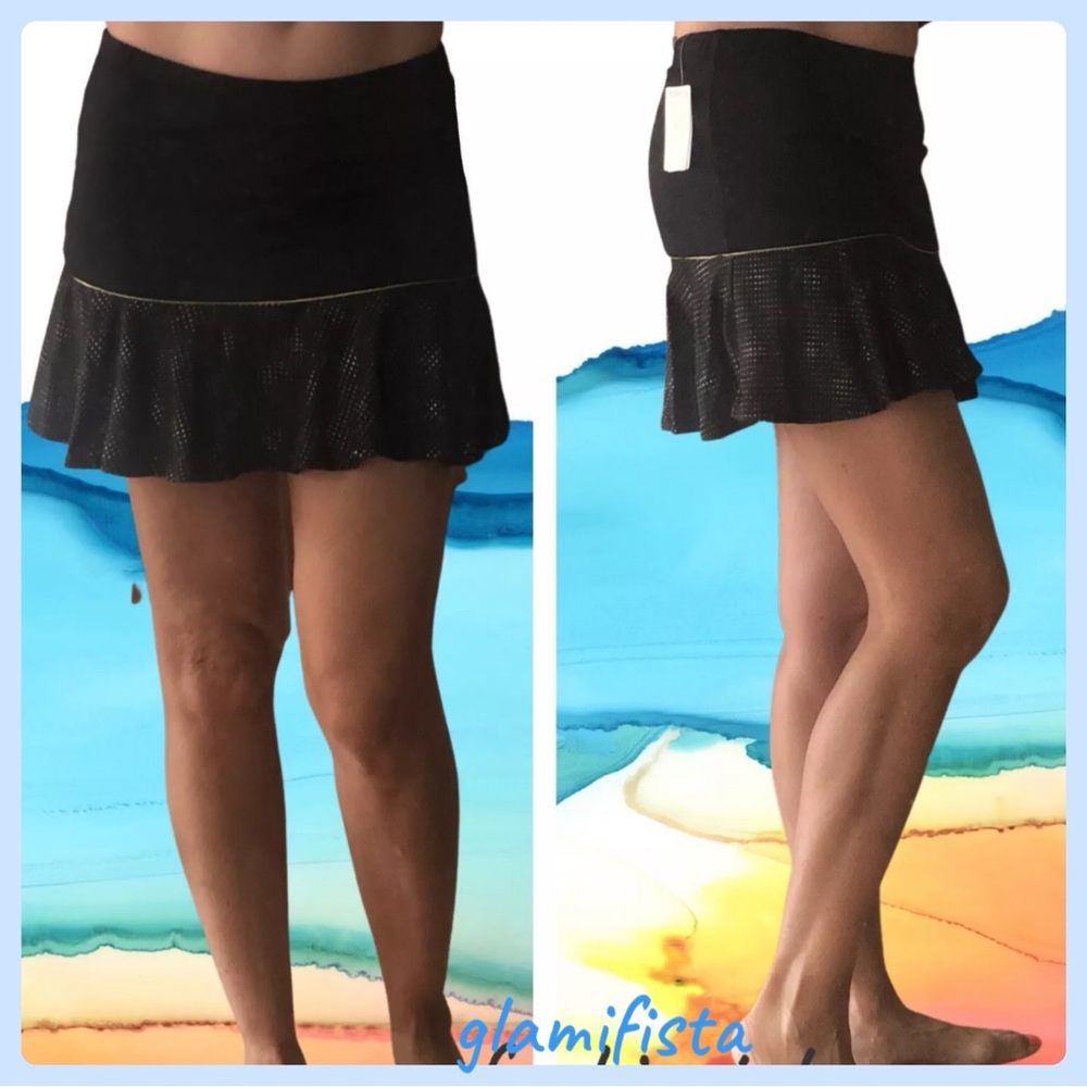 NWT Tail Women’s Black with light gold ruffle details tennis skort Sz.XS TALL